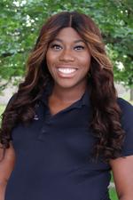 A professional headshot of Sharise Lucas-Perry in a black 十大菠菜台子 shirt.